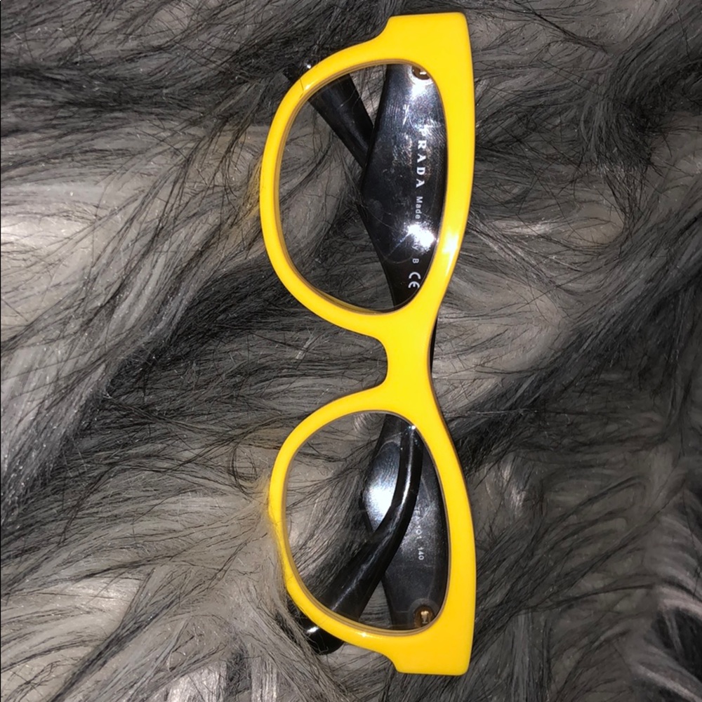 Women’s yellow Prada eyeglasses